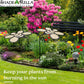 A vibrant garden features the Shade-A-Rella Super Sale! 24 inch Bee with black frame and light yellow 90% shade cloth—perfect for keeping your plants cool and protected from harsh sun, preventing burning.